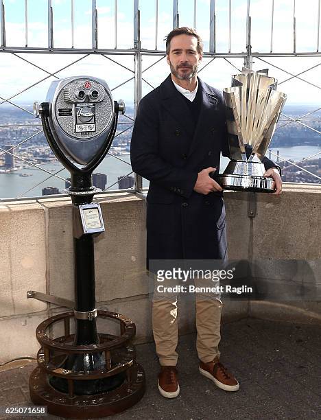 Nascar Sprint Cup series champion Jimmie Johnson poses for a picture during visit to The Empire State Building at The Empire State Building on...