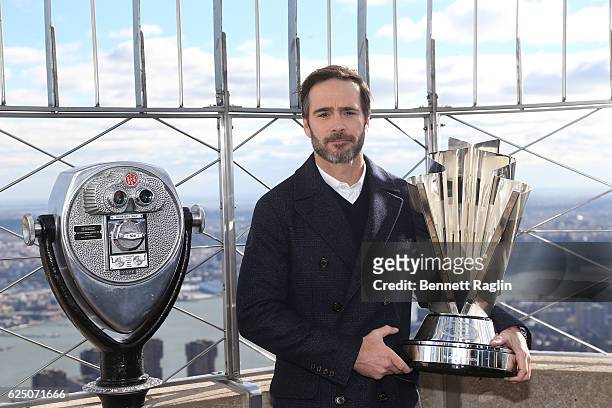 Nascar Sprint Cup series champion Jimmie Johnson poses for a picture during visit to The Empire State Building at The Empire State Building on...