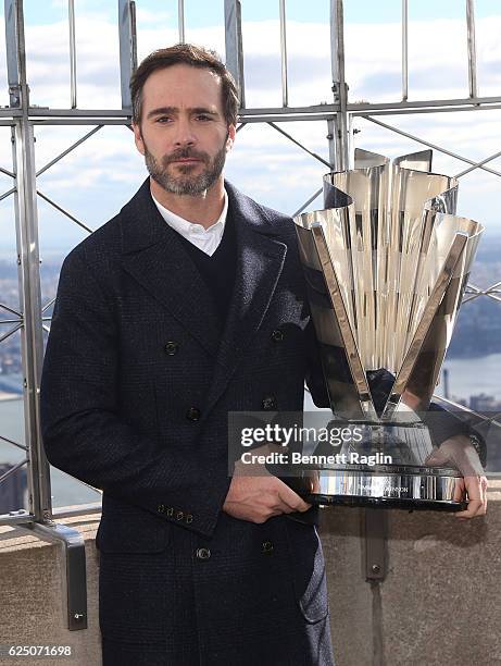 Nascar Sprint Cup series champion Jimmie Johnson poses for a picture during visit to The Empire State Building at The Empire State Building on...