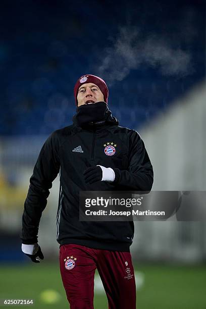 Robert Lewandowski of FC Bayern Muenchen warms up during FC Bayern Muenchen training ahead of the UEFA Champions League group D match between FC...