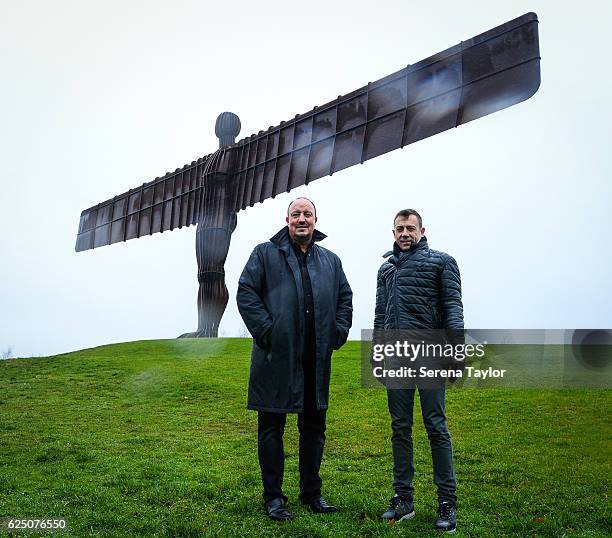 Newcastle Manager Rafael Benitez and Assistant Manager Francisco De Miguel Moreno pose for a photograph at a very wet and windy Angel of the North...