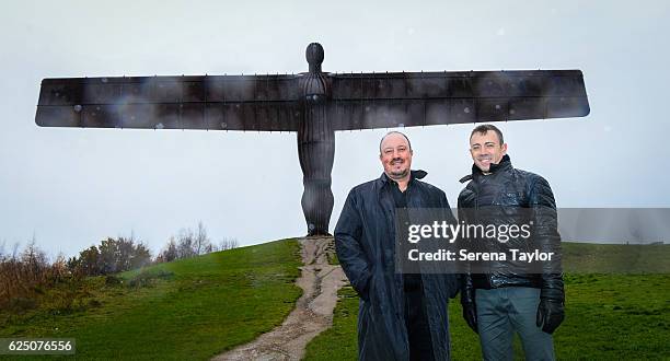 Newcastle Manager Rafael Benitez and Assistant Manager Francisco De Miguel Moreno pose for a photograph at a very wet and windy Angel of the North...