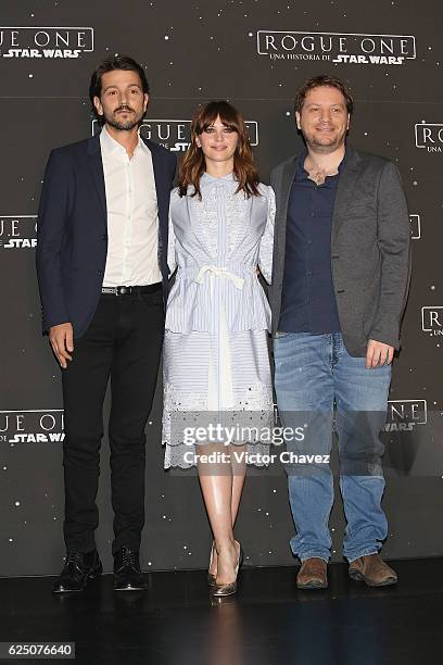 Diego Luna, Felicity Jones and film director Gareth Edwards pose to photographers during a photocall to promote the film "Rogue One: A Star Wars...