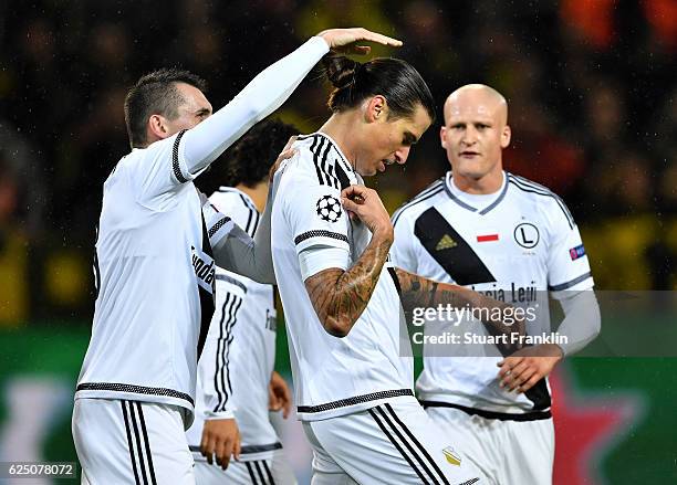 Aleksandar Prijovic of Legia Warszawa celebrates scoring his teams first goal during the UEFA Champions League Group F match between Borussia...