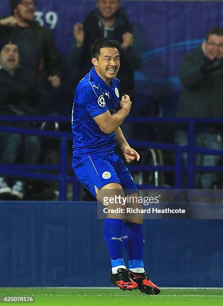 Shinji Okazaki of Leicester City celebrates scoring his sides first goal during the UEFA Champions League match between Leicester City FC and Club...