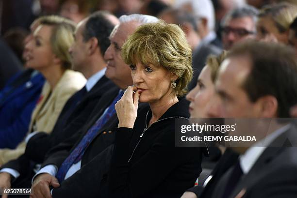 Isabelle Juppe, wife of Alain Juppe, mayor of Bordeaux and candidate for the French right-wing presidential primary, looks on during a public meeting...