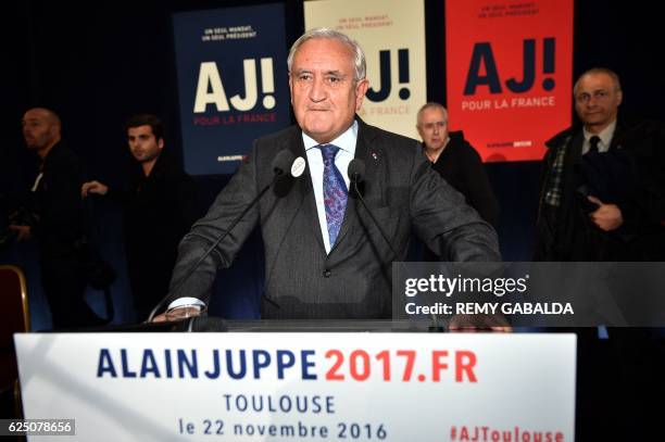 Former French prime minister Jean-Pierre Raffarin delivers a speech during a campaign meeting for Alain Juppe, mayor of Bordeaux and candidate for...