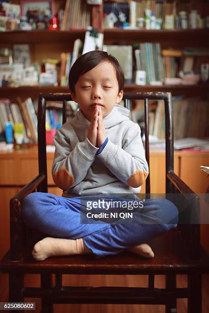 children in the study - child praying school stock pictures, royalty-free photos & images