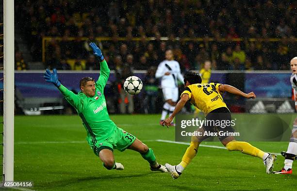 Shinji Kagawa of Borussia Dortmund scores his teams first goal during the UEFA Champions League Group F match between Borussia Dortmund and Legia...