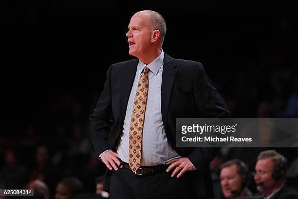 Head coach Tad Boyle of the Colorado Buffaloes directs his team against the Texas Longhorns in the first half during the consolation game of the...