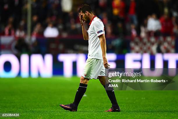 Franco Vazquez of Sevilla walks off after being shown a red card during the UEFA Champions League match between Sevilla FC and Juventus at Estadio...