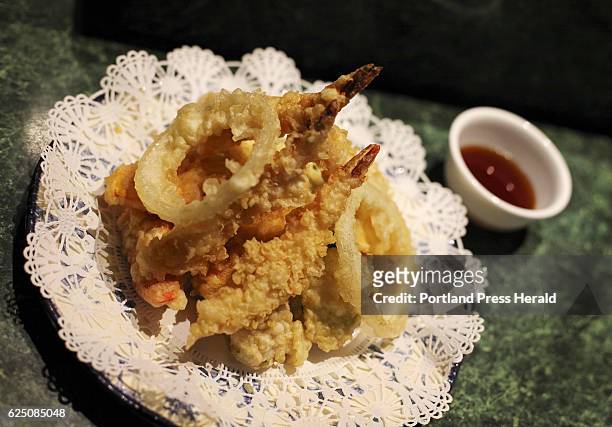Shrimp and vegetable tempura is deep fried in homemade batter and served with miso soup at Ginza Town.