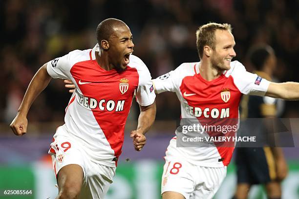 Monaco's French defender Djibril Sidibe celebrates with Monaco's French forward Valere Germain after scoring their first goal during the UEFA...