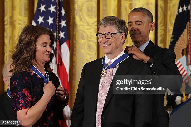President Barack Obama awards the Presidential Medal of Freedom to Microsoft founder Bill Gates and his wife Melinda Gates , who have donated...