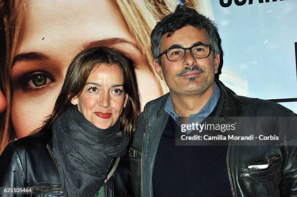 Paolo Genovese and Federica Rizzo walk a red carpet for 'La Cena Di Natale' on November 22, 2016 in Rome, Italy.