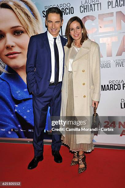 Cristina Parodi and Marco Liorni walk a red carpet for 'La Cena Di Natale' on November 22, 2016 in Rome, Italy.