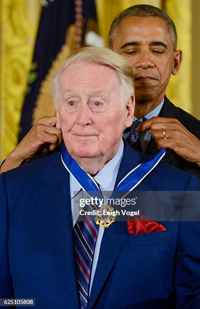 President Obama presents Vin Scully with the 2016 Presidential Medal Of Freedom at the White House on November 22, 2016 in Washington, DC.