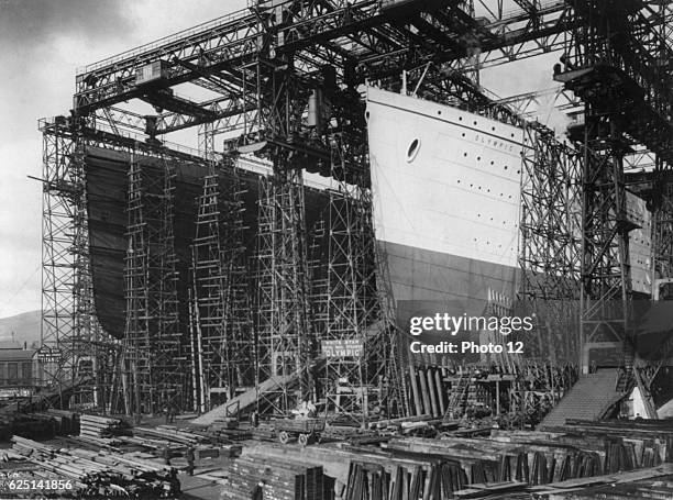 The White Star Line vessels Olympic and Titanic under construction in Harland and Wolff's shipyard, Belfast, Northern Ireland, 1909-1911.