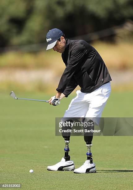 Mike Rolls plays a shot on Pro-Am Day ahead of the World Cup of Golf at Kingston Heath Golf Club on November 23, 2016 in Melbourne, Australia. At the...