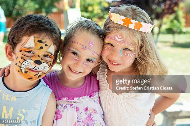 painted friends - face paint stock pictures, royalty-free photos & images