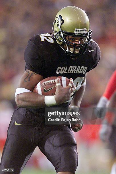 Tailback Chris Brown of Colorado runs into the endzone untouched against Nebraska to score a touchdown in the fourth quarter at Folsom Field in...