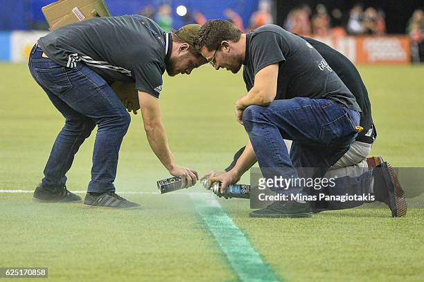 Game delayed between the Montreal Impact and the Toronto FC due to a technical error as field crews repaint the lines during leg one of the MLS...