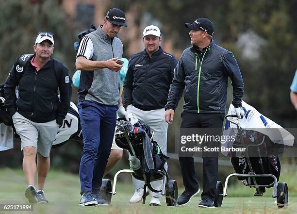 Graeme McDowell of Northern Ireland poses for a selfie photo with former cricketers Kevin Pietersen and Shane Warne and former AFL player Sam Newman...