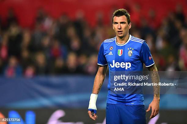 Mario Mandzukic of Juventus looks on during the UEFA Champions League match between Sevilla FC and Juventus at Estadio Ramon Sanchez Pizjuan on...