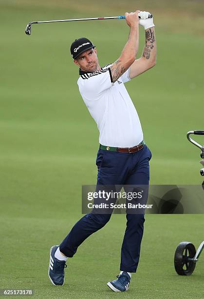 Former cricketer Kevin Pietersen plays a shot on Pro-Am Day ahead of the World Cup of Golf at Kingston Heath Golf Club on November 23, 2016 in...