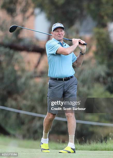 Former AFL player Sam Newman plays a shot on Pro-Am Day ahead of the World Cup of Golf at Kingston Heath Golf Club on November 23, 2016 in Melbourne,...