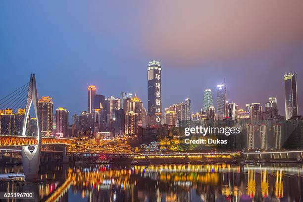 China, Chongqing City, Jiefangbei district, Qiansimen Bridge, Hongya Dong, Skyline.