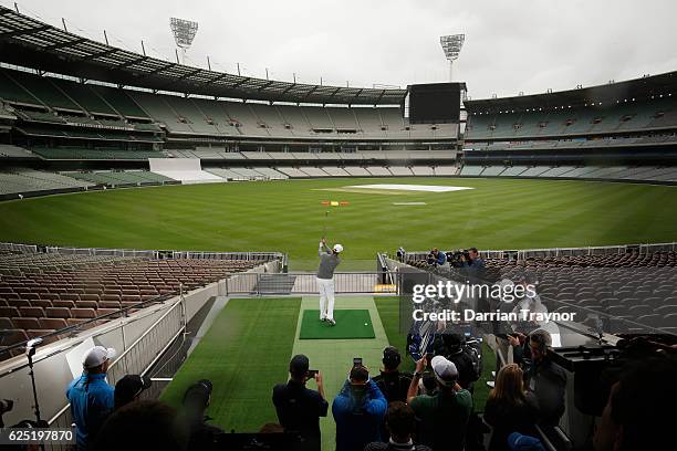 Jaco Van Zyl of South Africa hits a ball from the stands of the M.C.G. At a taget on the field ahead of the 2016 World Cup of Golf at Kingston Heath...