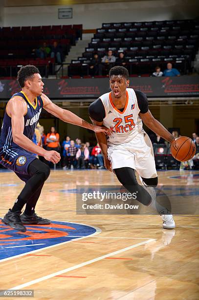 Damien Inglis of the Westchester Knicks dribbles the basketball against Wade Baldwin of the Iowa Energy at the Westchester County Center on November...