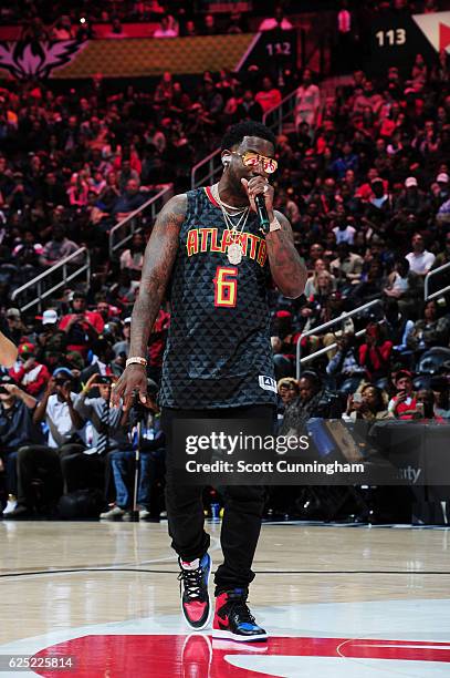 Rapper Gucci Mane performs at halftime during the game between the New Orleans Pelicans and the Atlanta Hawks on November 22, 2016 at Philips Arena...