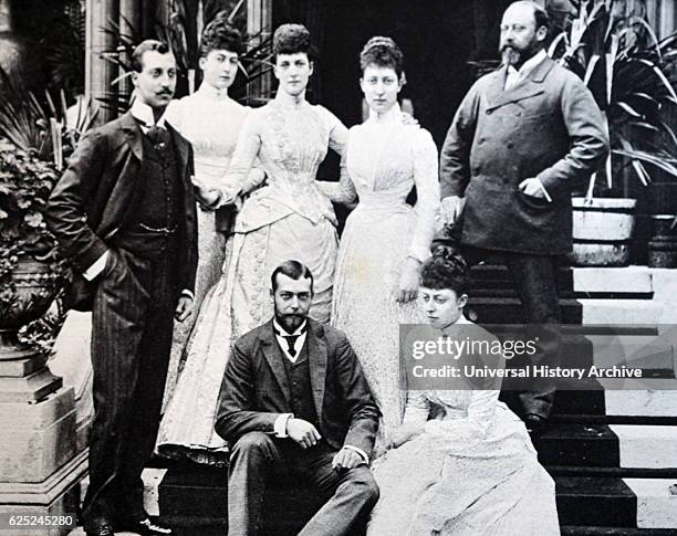 British royal family 1892. L to R standing: Prince Albert, Duke of Clarence; Maud of Wales; Queen Alexandra; Louise, Princess Royal; Prince . L to R...