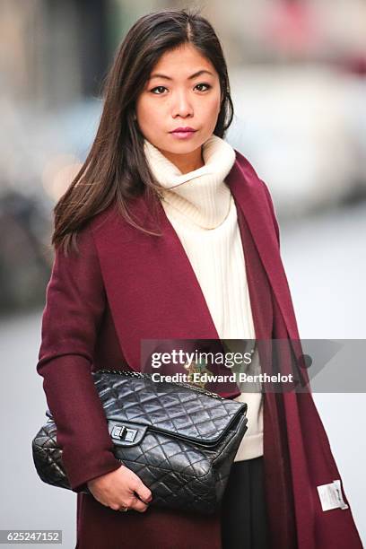 May Berthelot , is wearing New Look babies shoes, a Topshop skirt, New Look purple burgundy coat, a Chanel 2.55 black bag, Chanel bicolor tights with...