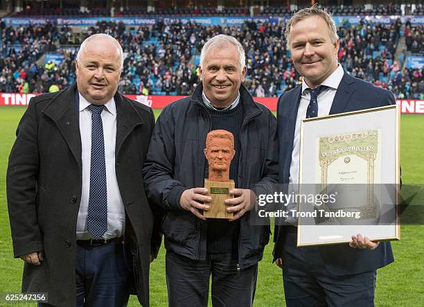 Rolf Navaseter of Sogndal receives The Kniksen Awards from President Terje Svendsen and General Secretary Kai-Erik Arstad of Norwegian Football...