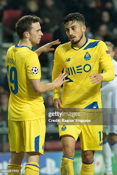 Diogo Jota of FC Porto and Alex Telles of FC Porto in action during the UEFA Champions League group stage match between FC Copenhagen and FC Porto at...