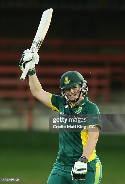 Lizelle Lee of South Africa celebrates and acknowledges the crowd after scoring a century during the women's One Day International match between the...