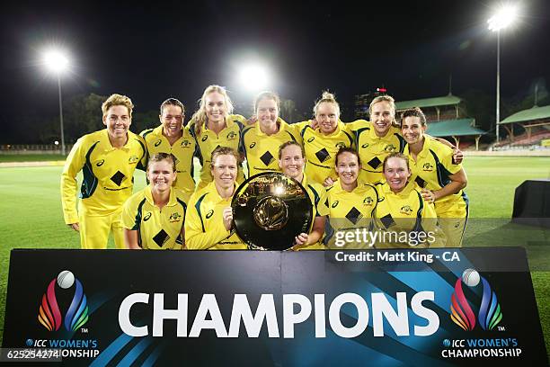 Australia pose with the ICC Womens Championship trophy after the women's One Day International match between the Australian Southern Stars and South...