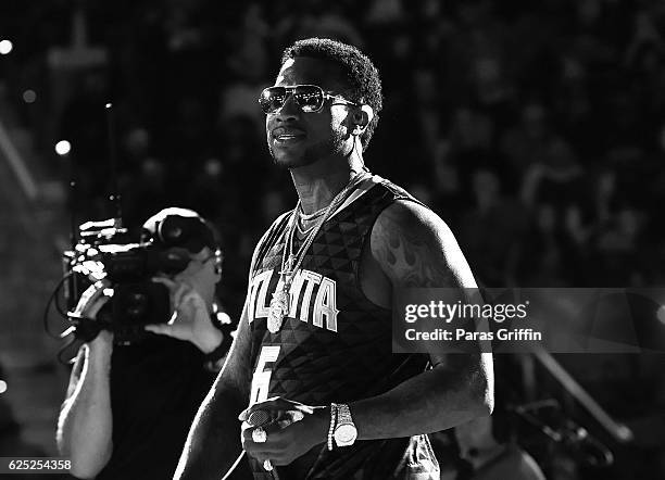 Rapper Gucci Mane performs at Hawks Tip Off the Holidays with Gucci Mane at Philips Arena on November 22, 2016 in Atlanta, Georgia.