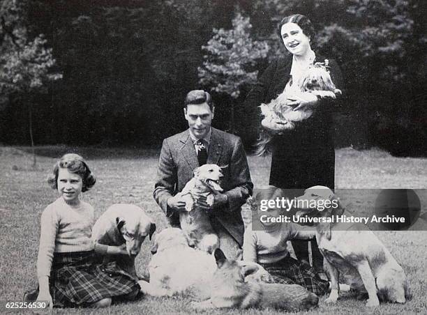 Photograph of King George VI , the Queen Mother , Queen Elizabeth II and Princess Margaret . Dated 20th Century.