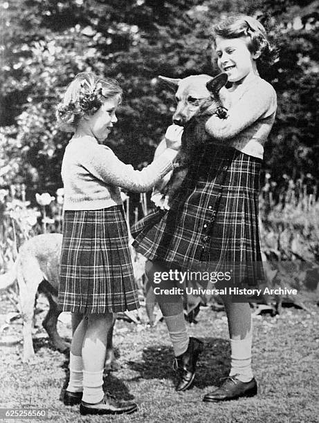 Photograph of Queen Elizabeth II and Princess Margaret . Dated 20th Century.