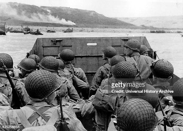 Photograph of American troops approaching Omaha Beach, Normandy, on D-Day. Dated 20th Century.