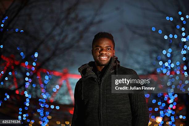 Tennis player Frances Tiafoe of USA poses for photos by the London Eye on November 21, 2016 in London, England.