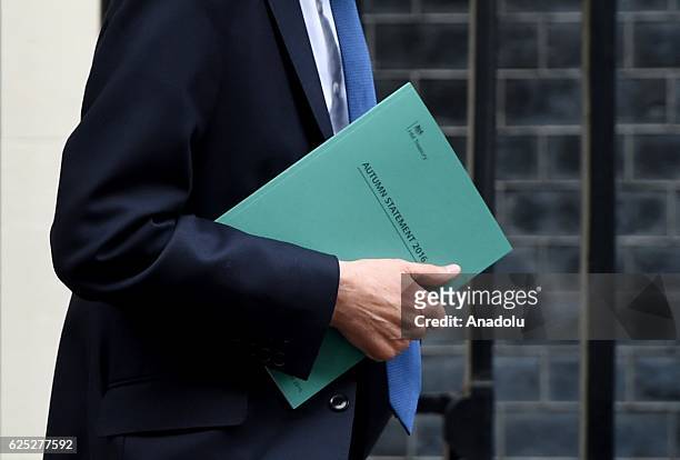 Chancellor of the Exchequer, Philip Hammond leaves 11 Downing Street to deliver his Autumn Statement to Parliament on November 23, 2016 in London,...
