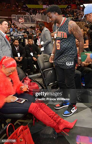 Keyshia Ka'oir and Gucci Mane attend the Hawks V Pelicans at Philips Arena on November 22, 2016 in Atlanta, Georgia.