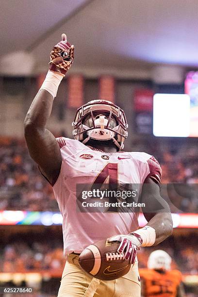 Dalvin Cook of the Florida State Seminoles celebrates a touchdown run during the game against the Syracuse Orange on November 19, 2016 at The Carrier...