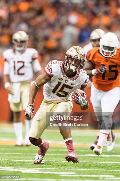 Travis Rudolph of the Florida State Seminoles runs with the ball during the game against the Syracuse Orange on November 19, 2016 at The Carrier Dome...