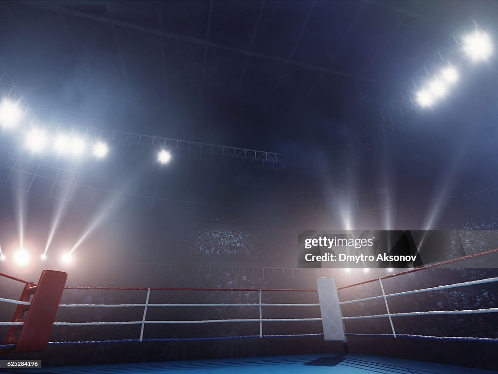 Boxe: anello professionale vuoto con folla